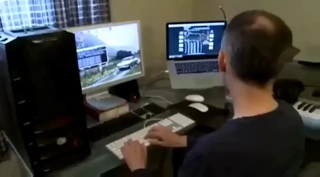 A person mining Bitcoin on a desktop computer inside a home bedroom in 2011